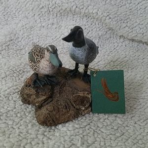 Woodcarved ducks